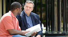 Professor talking to student
